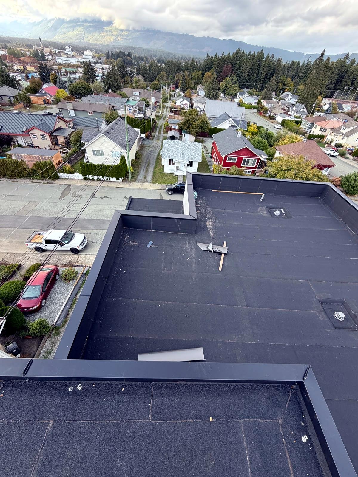 Completed flat roof membrane with sealed seams in Duncan, BC