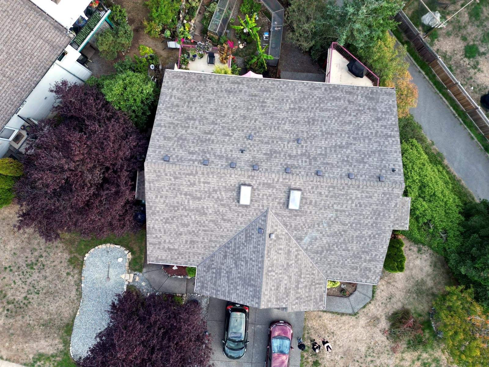 New architectural shingle roof with clean ridge lines on a Nanaimo home