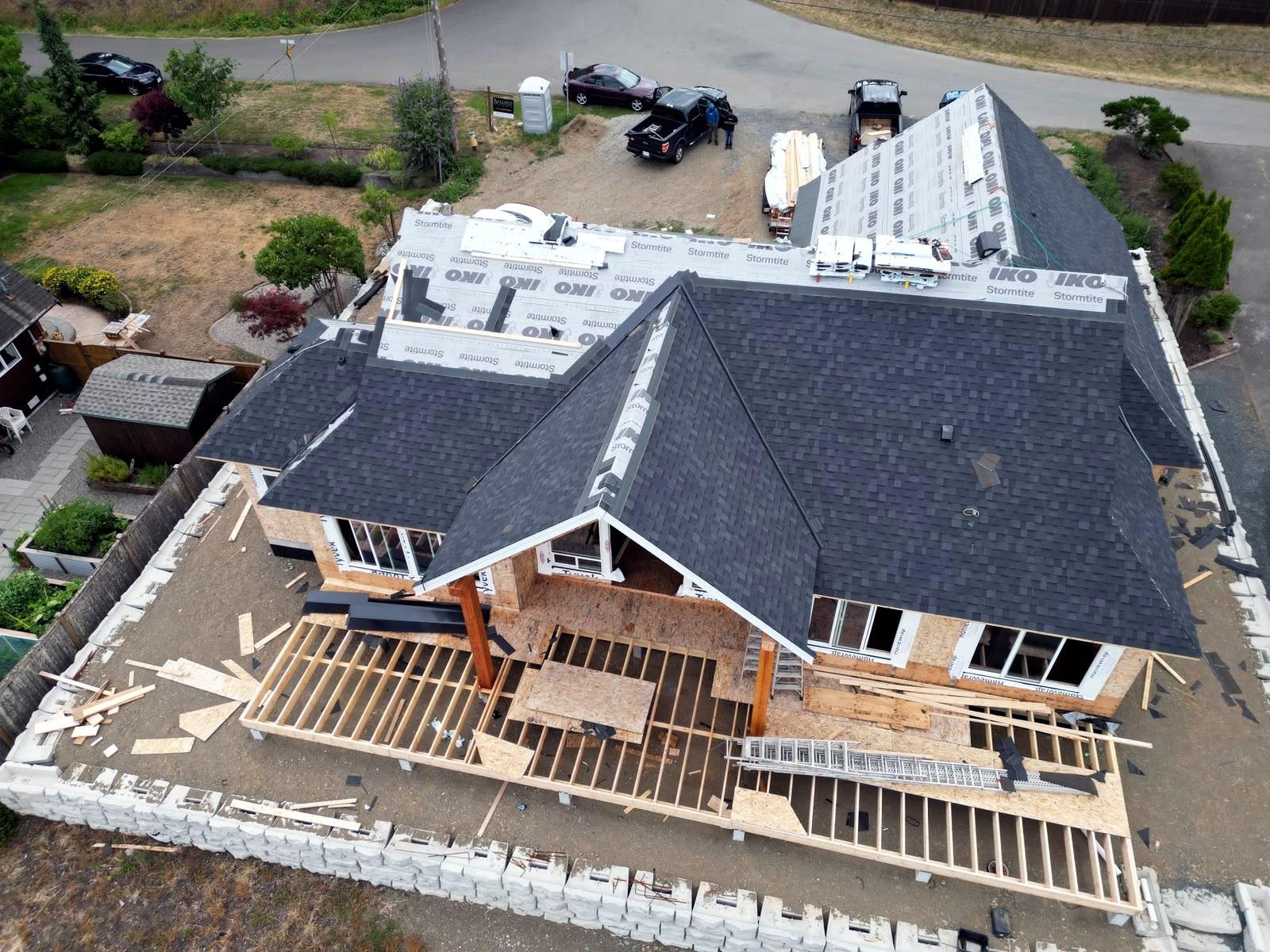 Aerial view of a newly roofed home under construction in Qualicum Beach