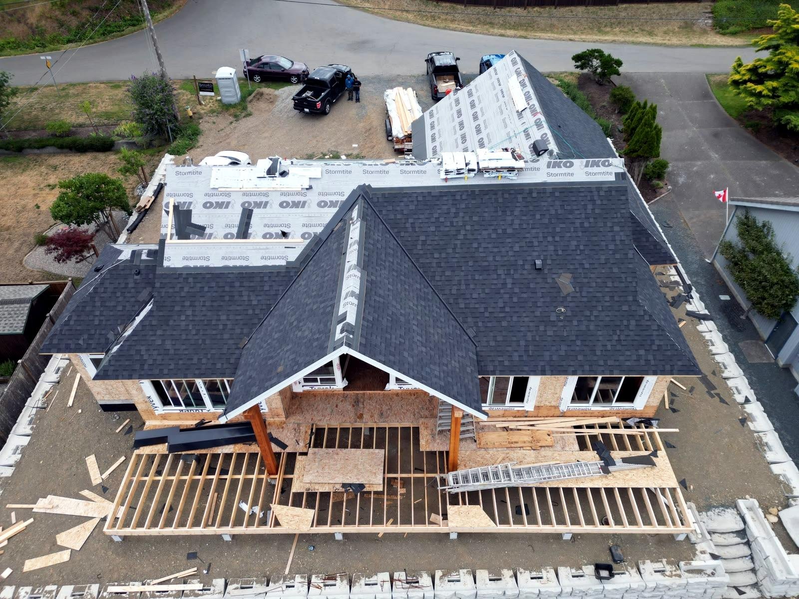 New dark shingle roof on a Qualicum Beach new build
