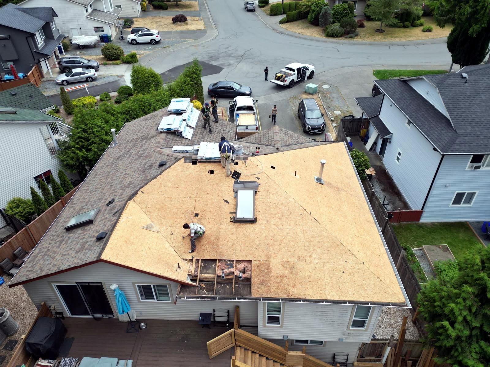 Aerial view of storm damage tear-off in progress in Nanaimo