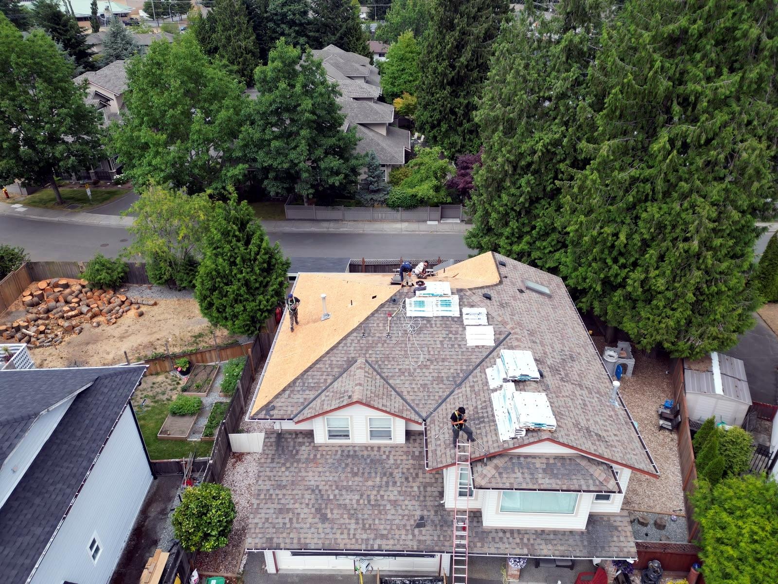 Eco Roofing crew finishing a storm-damage re-roof in Nanaimo