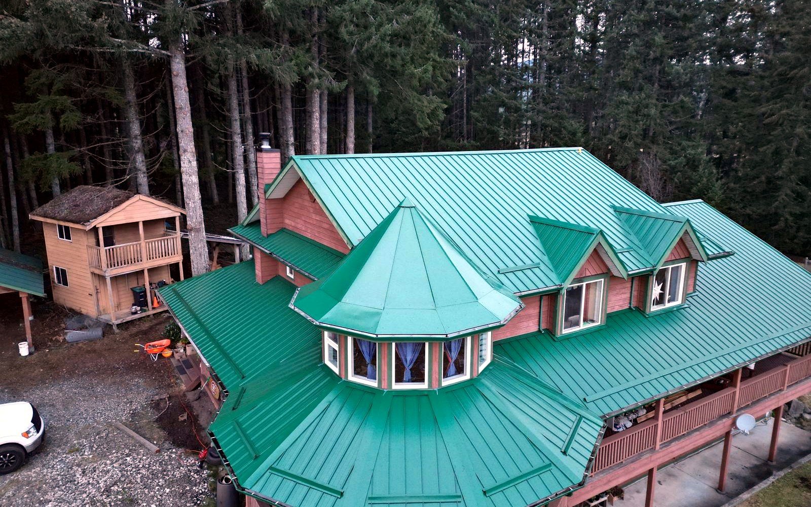 Metal roof on a Vancouver Island home installed by Eco Roofing Ltd